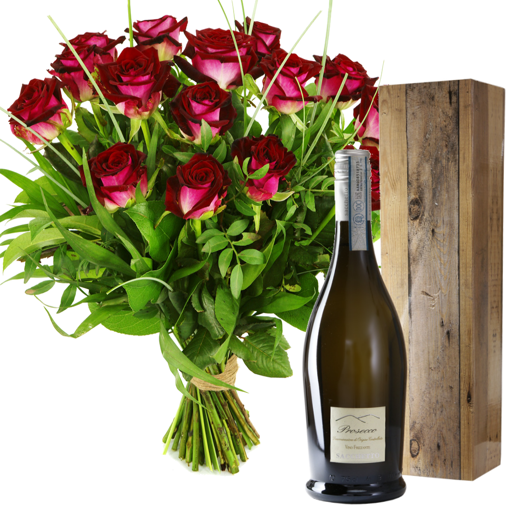 Prosecco en boeket rode rozen